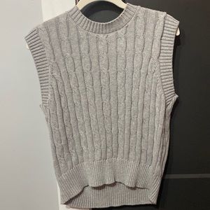 grey sweater vest